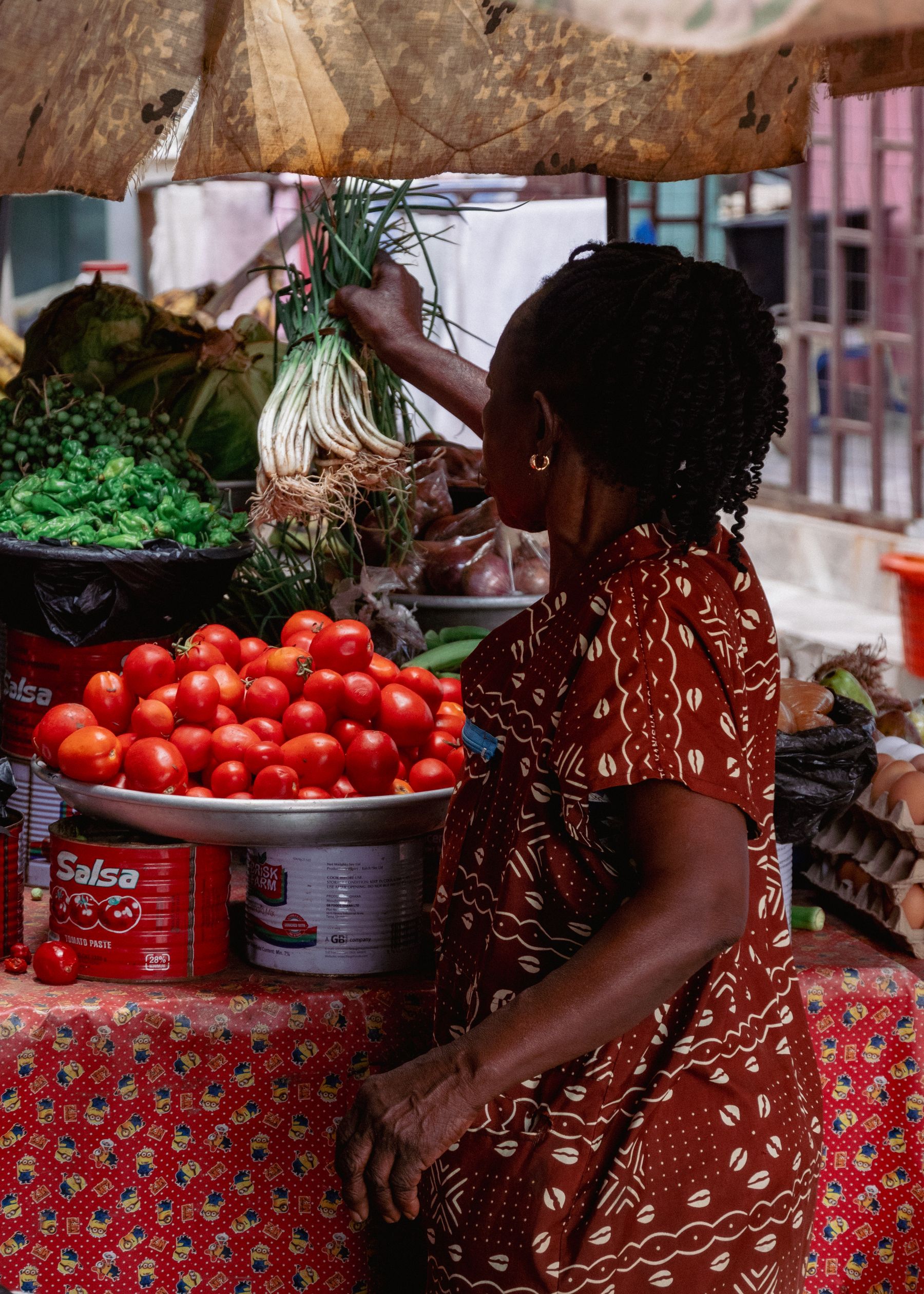 Live African agricultural market with fresh farm produce and traders